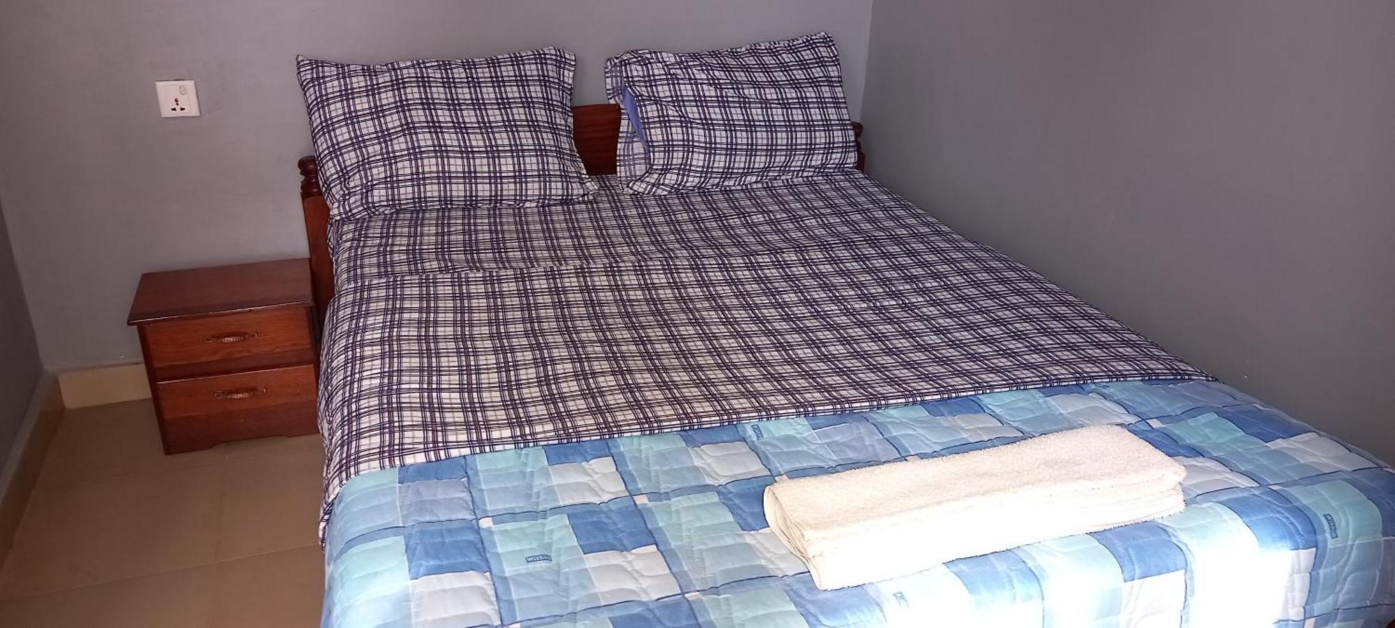 كيغالي G Masters Homes الغرفة الصورة